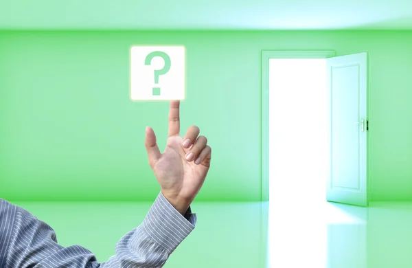 Бизнес-концепция с бизнес-рукой на фоне зеленой пустой комнаты . — стоковое фото