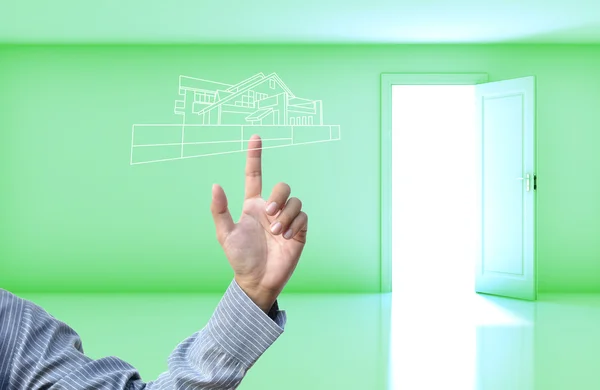 Concepto de negocio con mano de negocios sobre fondo verde de la puerta abierta habitación vacía . — Foto de Stock