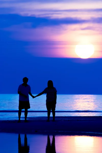 Familj på stranden — Stockfoto