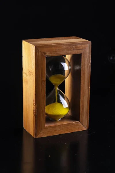 Wooden Designer Hourglass Black Background Isolate Concept — Stok fotoğraf