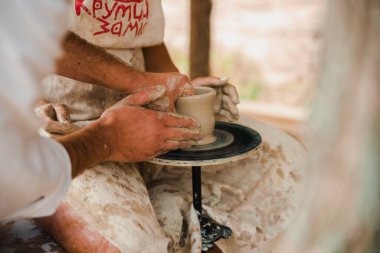 Modeling pottery on the machine. Festival of Ukrainian culture. Cherkasy, Ukraine August 1, 2019.