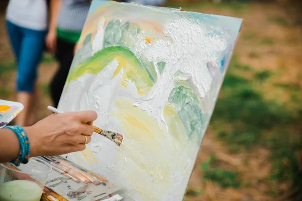 Artists paint pictures at the festival of Ukrainian culture August 1, 2019.