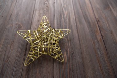 Tahta kahverengi arka planda Noel yıldızı.
