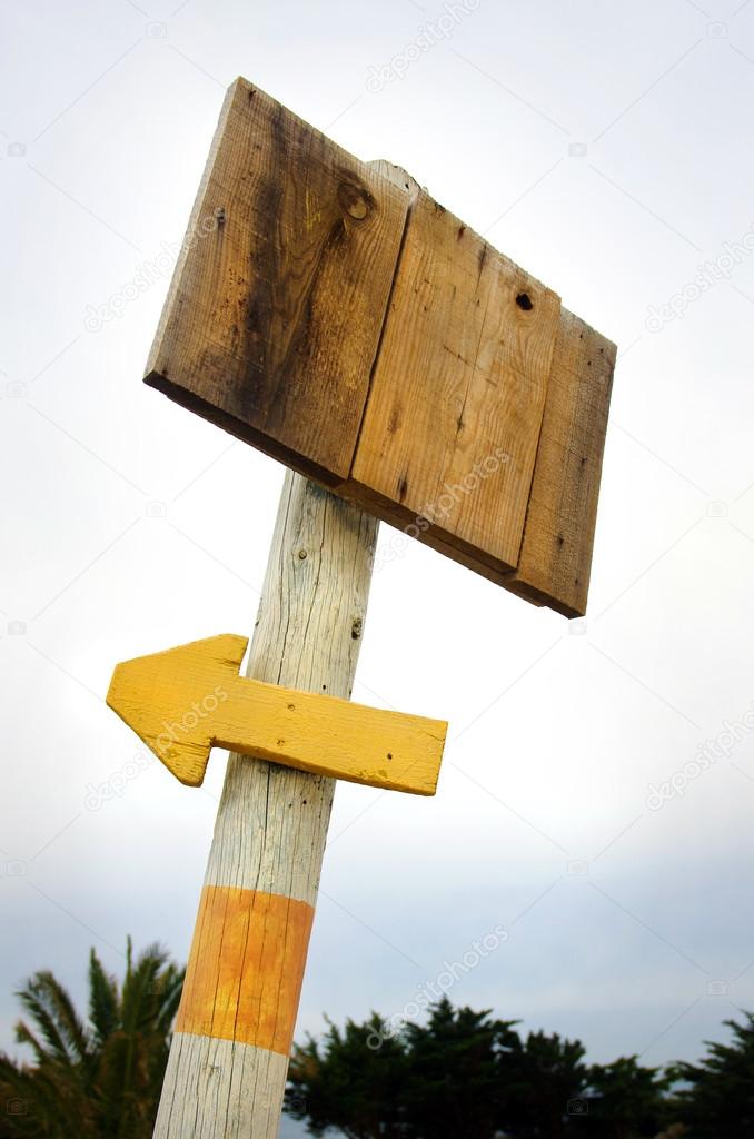 Wooden placard a arrow