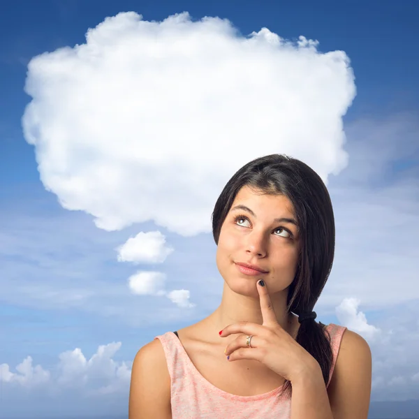 Flicka med tänkande moln — Stockfoto