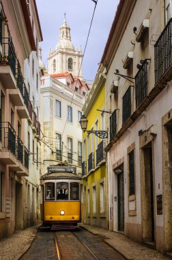 Narrow street in old Lisbon clipart