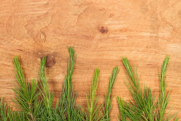 Fir Branches Wooden Background — Stock Photo, Image