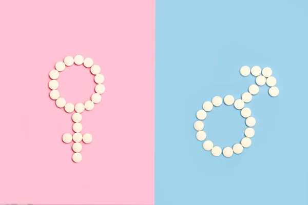 Medicinska Piller Kvinnliga Och Manliga Symbol Form Ljusblå Och Rosa — Stockfoto