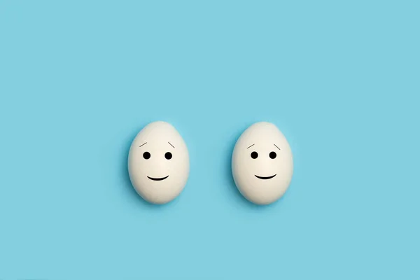 Two Eggs Happy Face Shape Blue Background — Stock Photo, Image