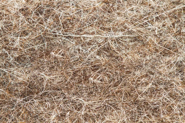 Yakın bir görüntüde kahverengi yün kumaş dokusu