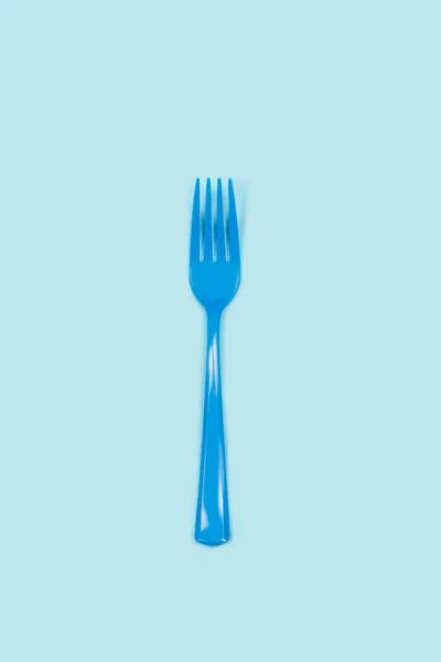 Disposable Blue Plastic Fork Light Blue Background Copy Space — Stockfoto