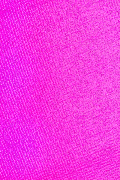 Texture of a purple yoga mat in a close up view