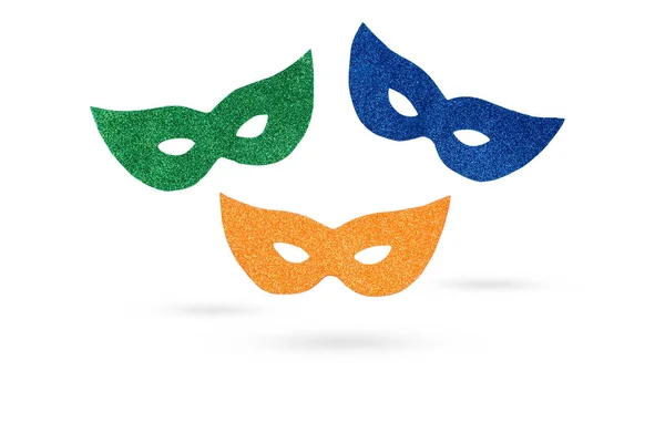 Colored party glitter eye masks floating on a white background with copy space