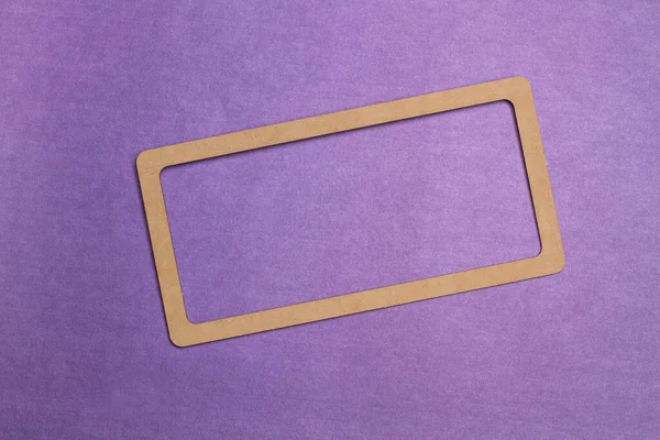 Brown Cardboard Frame Purple Background Copy Space — Foto Stock