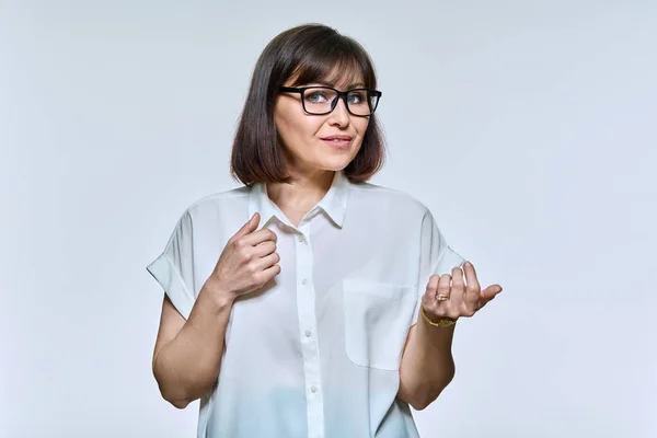 Middle Age Business Woman Glasses Talking Looking Camera Light Studio — Stock Photo, Image