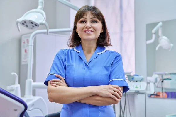 Portrait Smiling Nurse Looking Camera Dentistry Confident Female Folded Hands — Photo