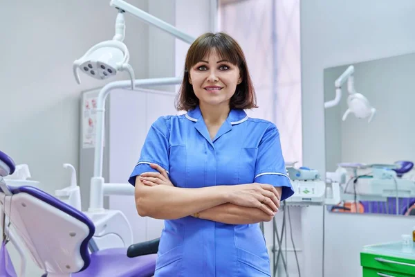 Portrait Smiling Nurse Looking Camera Dentistry Confident Female Folded Hands — Photo