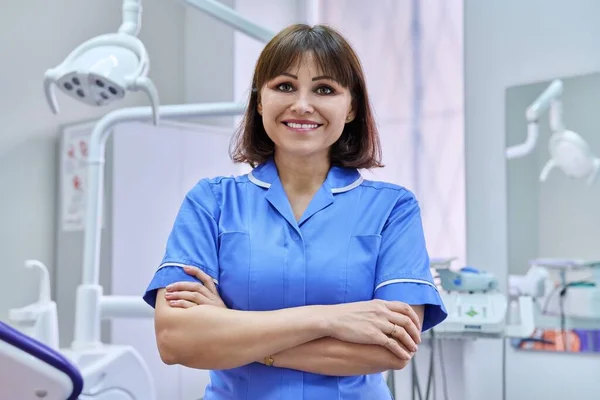 Portrait Smiling Nurse Looking Camera Dentistry Confident Female Folded Hands — Photo