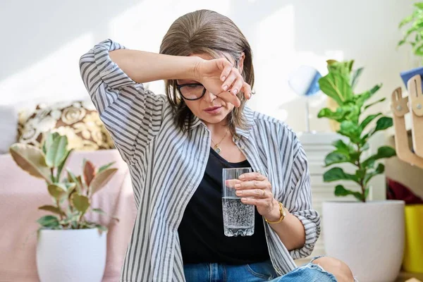 Mature Woman Suffering Headache Home Glass Water Health Stress Depression — Fotografia de Stock