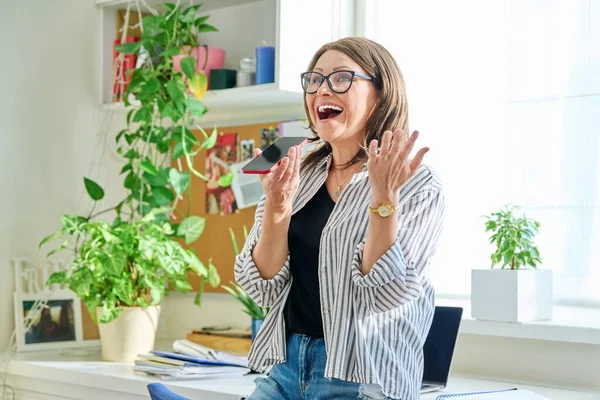 Positive Smiling Mature Woman Recording Voice Message Phone Home Interior — Stock Photo, Image