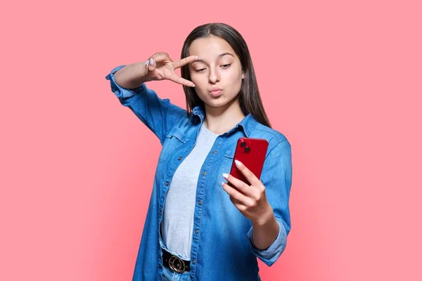 Happy Teenage Girl Taking Selfie Smartphone Showing Victory Success Gesture — Foto de Stock