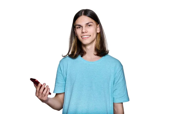 Teenager Guy Smartphone His Hands White Isolated Background Smiling Happy — стоковое фото