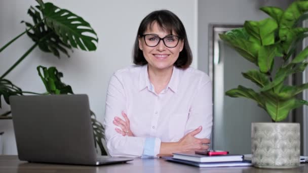 Middle Aged Smiling Business Woman Looking Camera While Sitting Her — Stock videók
