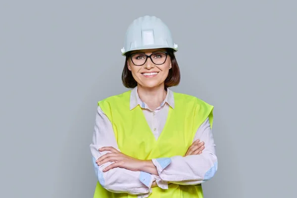 Portrait Female Industrial Worker Protective Helmet Vest Gray Color Background — 图库照片