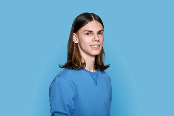 Headshot Portrait Cheerful Teenage Guy Looking Camera Blue Color Background — Stock Fotó