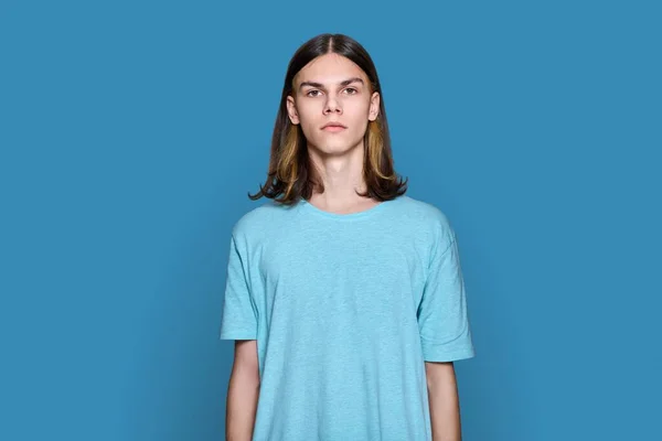 Portrait Serious Teenage Guy Looking Camera Blue Color Background Handsome — Stockfoto