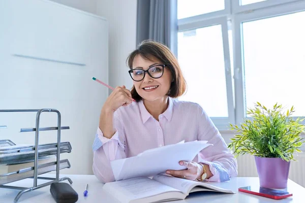 Middle Aged Female Working Home Table Papers Smiling Mature Woman — Stock Fotó