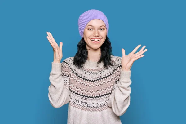 Happy Emotional Teenage Female Sweater Hat Light Blue Background Surprised — Foto Stock