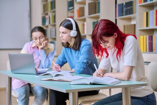 Group Teenage Students Study Desks Library Class Teen Students Writing — Fotografia de Stock