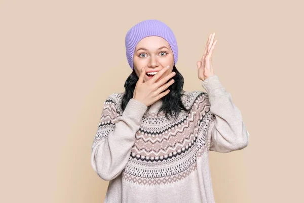 Happy Emotional Teenage Female Sweater Hat Light Brown Background Surprised — 图库照片