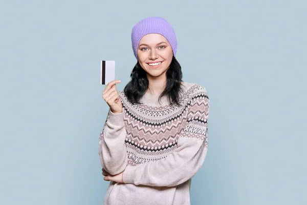 Young Beautiful Teenage Female Credit Card Light Gray Background Happy — Stok Foto