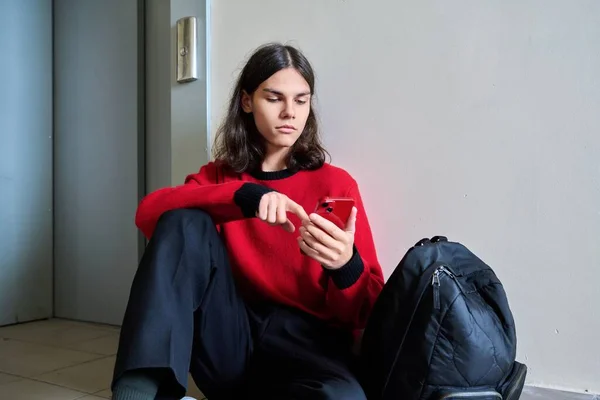 Young Teenage Male Sitting Floor Elevator Smartphone Handsome Teen Guy — Stock Fotó