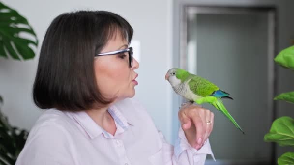 Mature Woman Home Pet Parrot Her Arm Female Owner Talking — Stock Video
