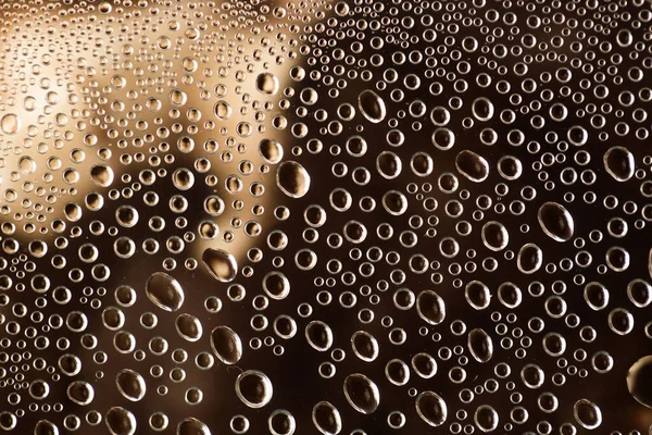 Wassertropfen für den Hintergrund auf Glas. — Stockfoto