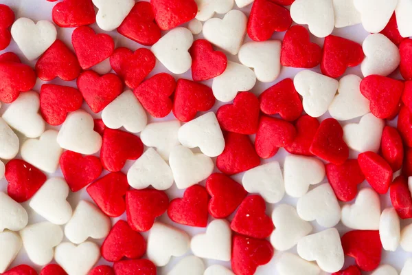Fond de petits coeurs pour décorer des bonbons. — Photo