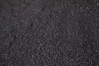 Caddedeki yolların tamiri, asfalt kaplama