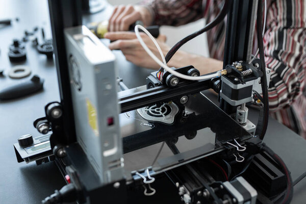 3D printing machine operation in the laboratory.