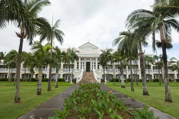 stock image Luxury house in Mauritius, with a green lawn and palm trees