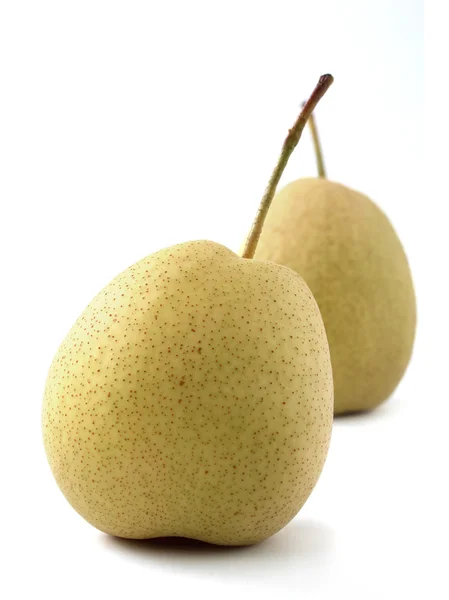 Closeup(macro) photo of two fully ripe, juicy organic pears on w — Stock Photo, Image