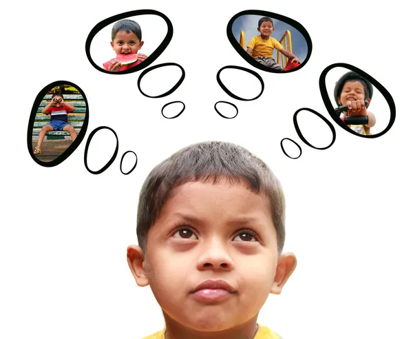 Junges indisches Kind (Junge) träumt vom Spielen, Essen und Spaß haben — Stockfoto