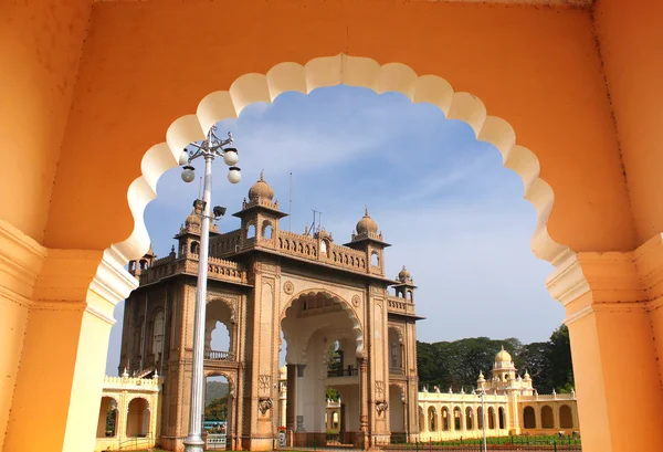 Entrance of majestic mysore palace from an arch. The palace is a