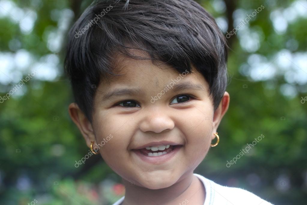 Beautiful young indian girl child smiling & happy and having fun Stock Photo by ©smarnad 19215009 Beautiful young indian girl child smiling & happy and having fun Stock Photo by ©smarnad 19215009