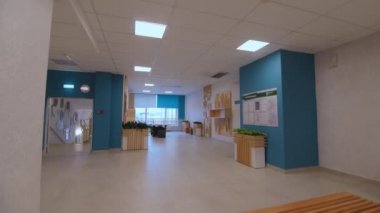 Hallway with sofa and table for visitors and children area
