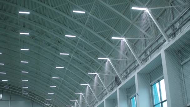 Rows of led lamps on arch ceiling of spacious gym hall — Stok video