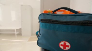 Bag with first aid kit in therapist office at hospital