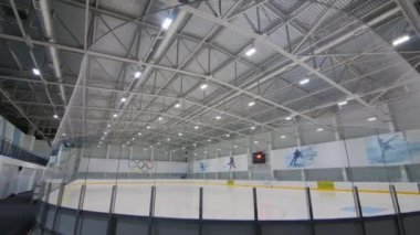 Motion past skating rink for sports competitions on stadium